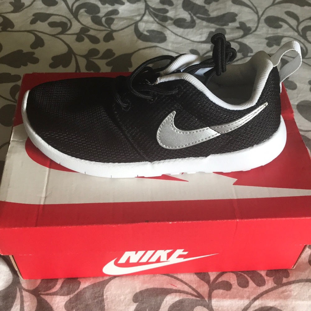Brand new little kid Nike shoes